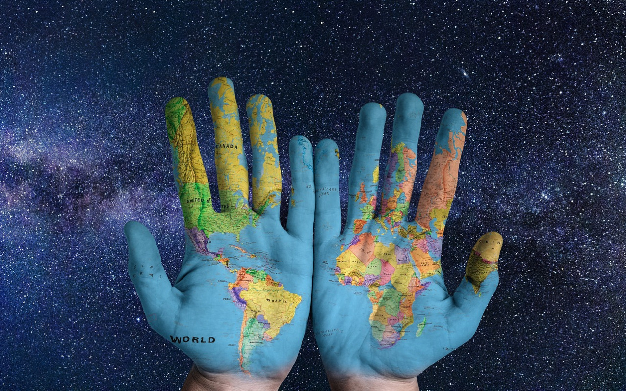 hands holding earth globe